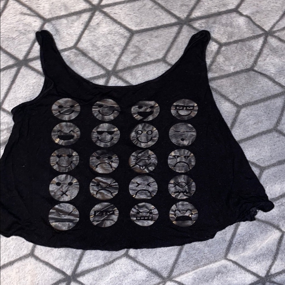 Black emoji shirt.